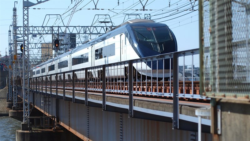 A Keisei limited-express train crossing a bridge